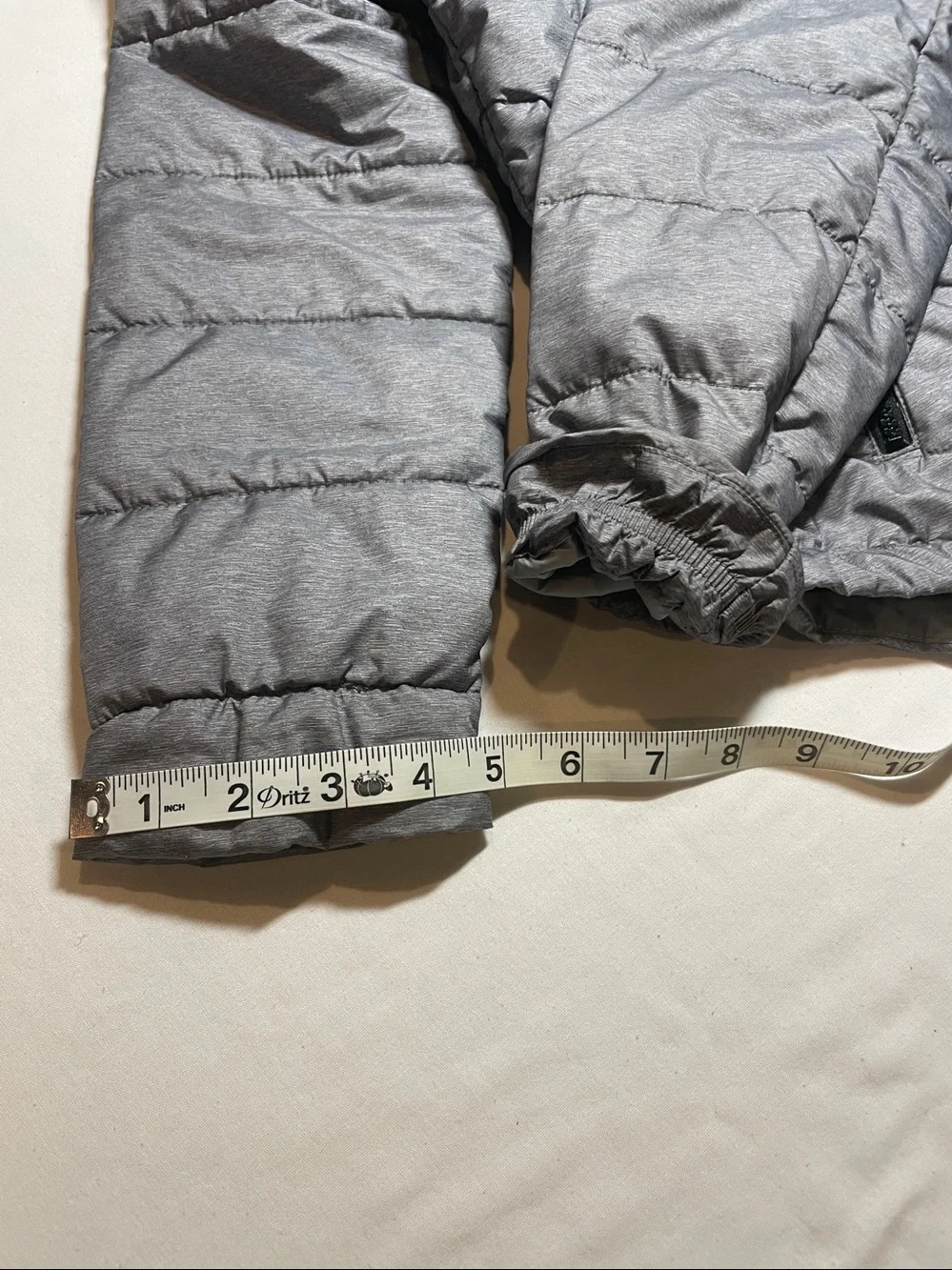 The North Face Women's Light Silver Quilted Puffer Jacket